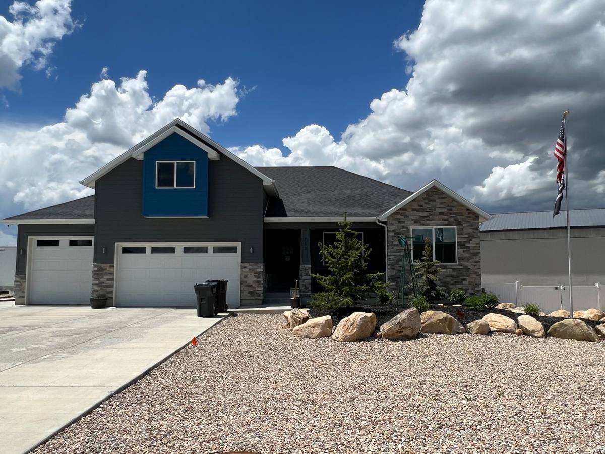 New construction exterior painting Park City Utah gray blue siding