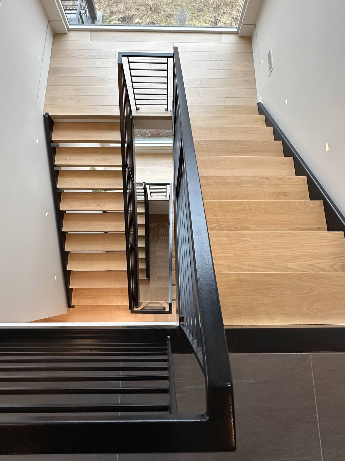 Floating staircase interior painting Park City modern home