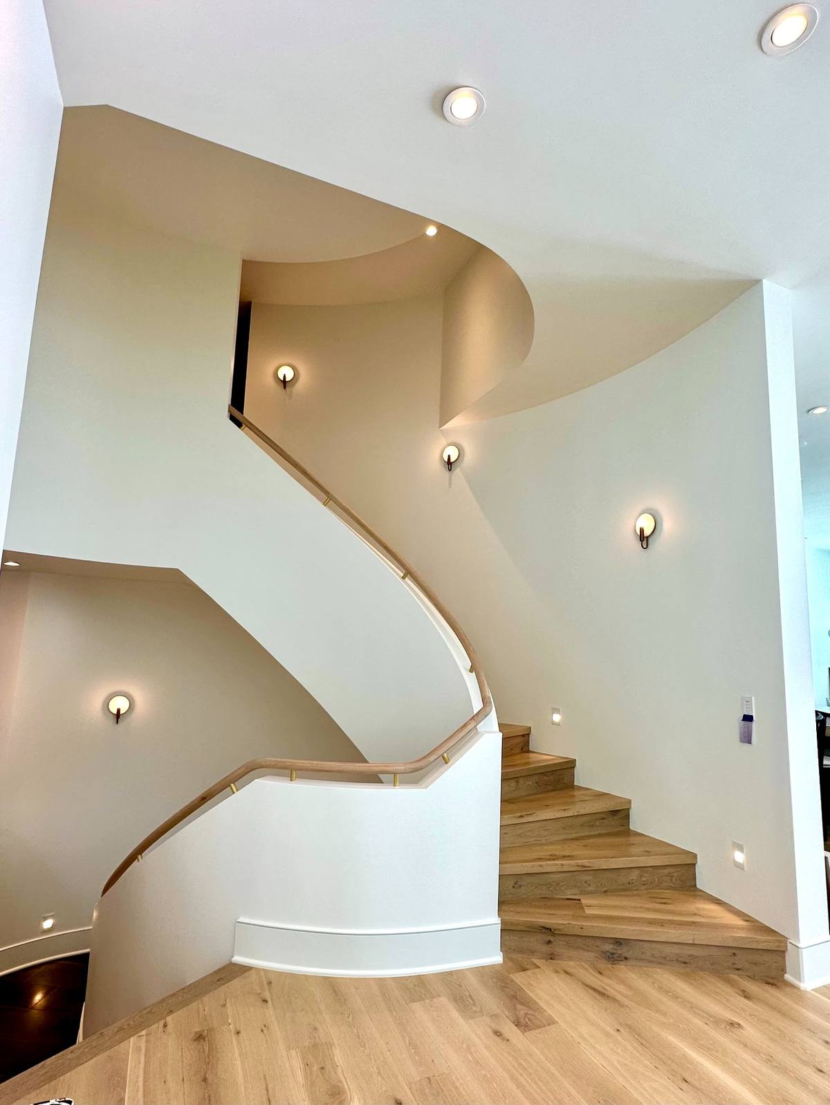 Curved staircase interior painting Park City luxury home