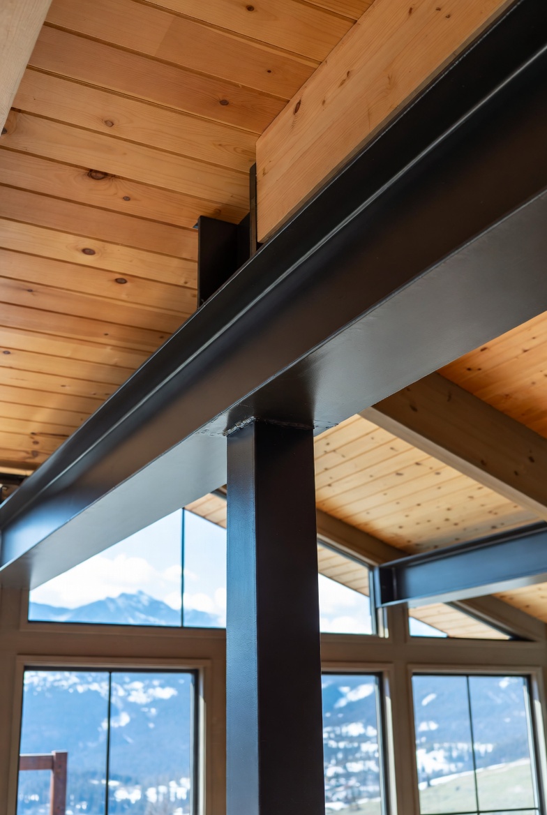 Metal beam painting Park City Utah steel structural mountain home interior